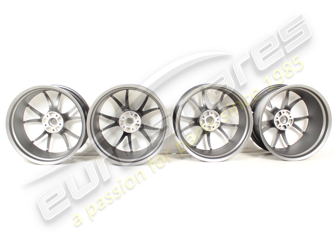 NEW FERRARI WHEEL SET (FORGED GRIGIO CORSA DIAMOND POLISHED) 20 INCH WITH STUDS. PART NUMBER 70002004 (4) new ferrari wheel set (forged grigio corsa diamond polished) 20 inch with studs. part number 70002004 (4)
