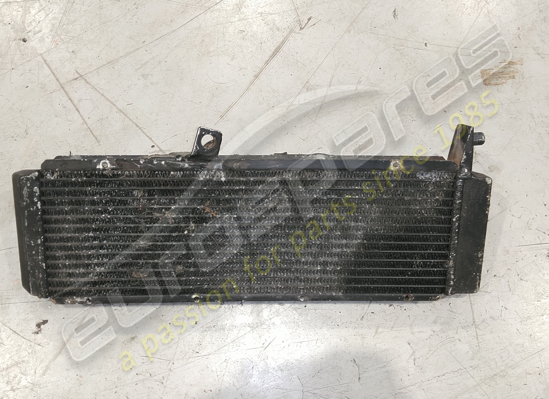 DAMAGED FERRARI OIL RADIATOR. PART NUMBER 164616 (2) damaged ferrari oil radiator. part number 164616 (2)