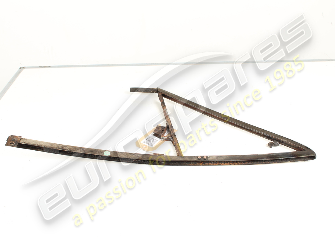 USED FERRARI RH FRONT QUARTER GLASS FRAME. PART NUMBER 20283200 (2) used ferrari rh front quarter glass frame. part number 20283200 (2)