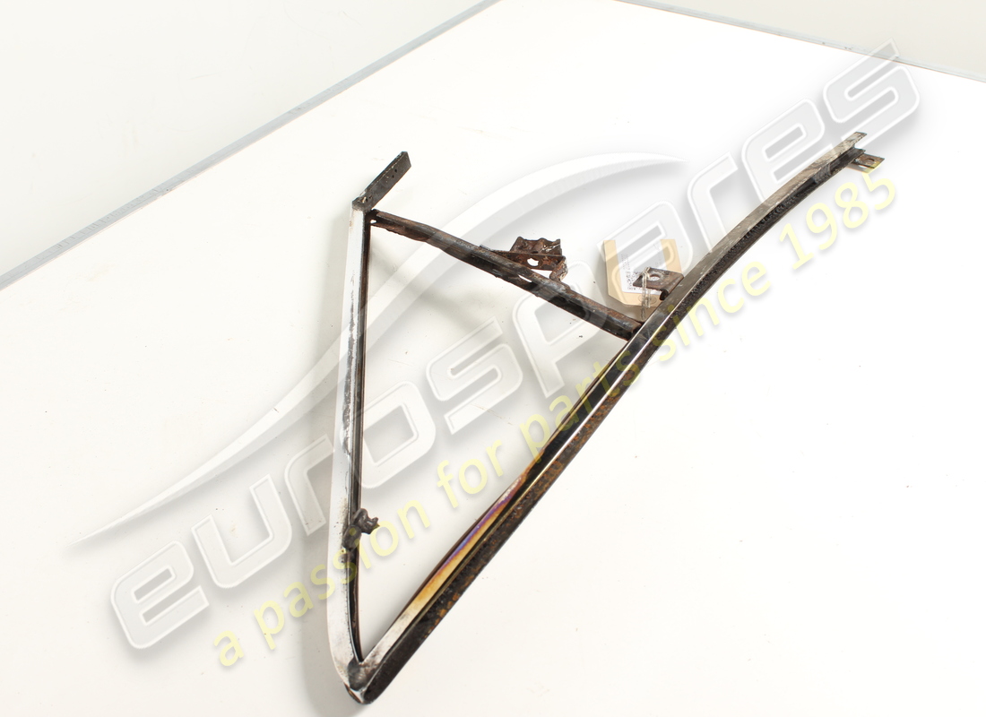 USED FERRARI RH FRONT QUARTER GLASS FRAME. PART NUMBER 20283200 (4) used ferrari rh front quarter glass frame. part number 20283200 (4)