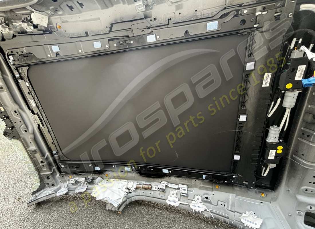 NEW MASERATI BLACK PANORAMIC ROOF. PART NUMBER 670269157 (2) new maserati black panoramic roof. part number 670269157 (2)