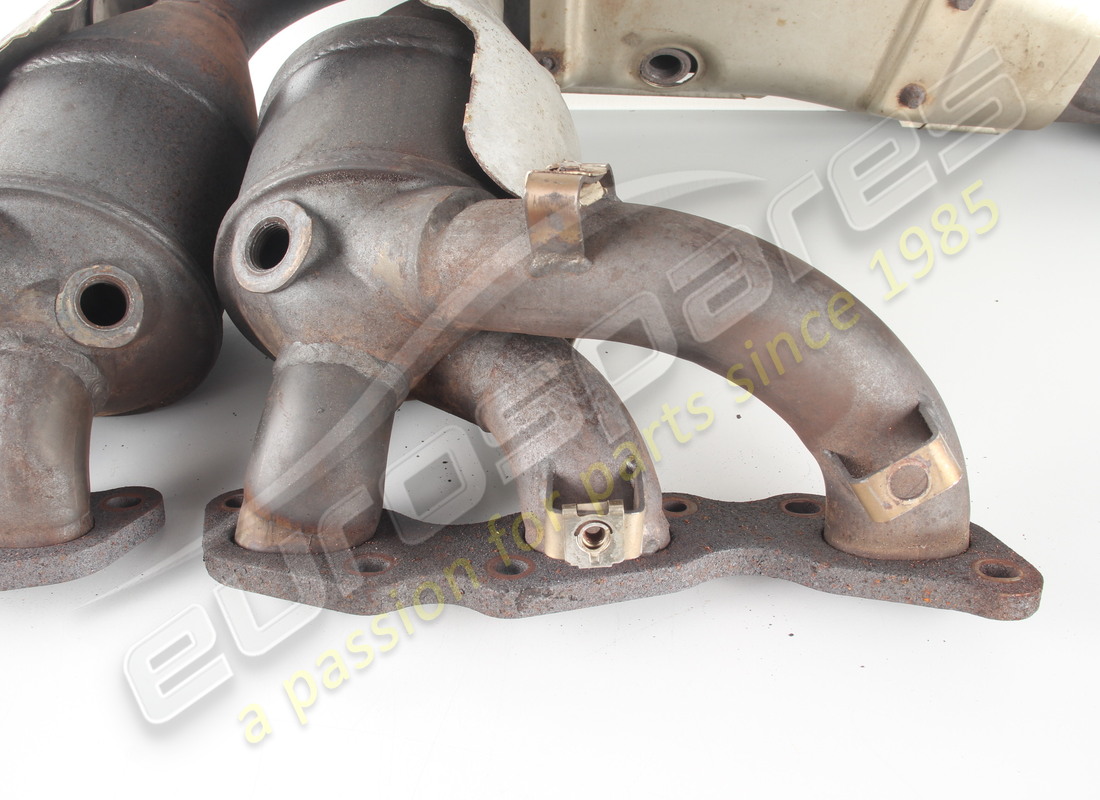 USED ASTON MARTIN MANIFOLD AND CAT CONVERTER ASSEMBLY, RH PART NUMBER 4G4E5G236BE (8) used aston martin manifold and cat converter assembly, rh part number 4g4e5g236be (8)