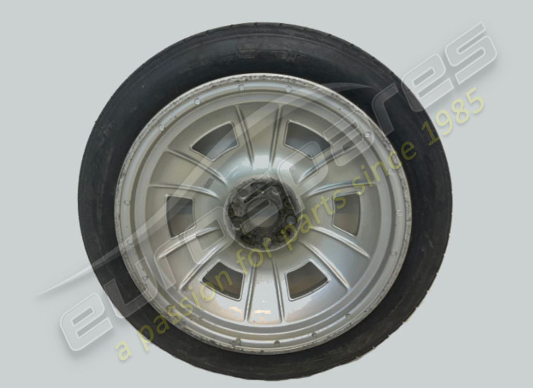 USED FERRARI SPARE WHEEL 3 1/4 BX18. PART NUMBER 105593 (3) used ferrari spare wheel 3 1/4 bx18. part number 105593 (3)