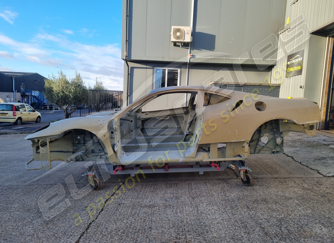 NEW FERRARI SCUDERIA BODYSHELL. PART NUMBER 80557000 (2) new ferrari scuderia bodyshell. part number 80557000 (2)