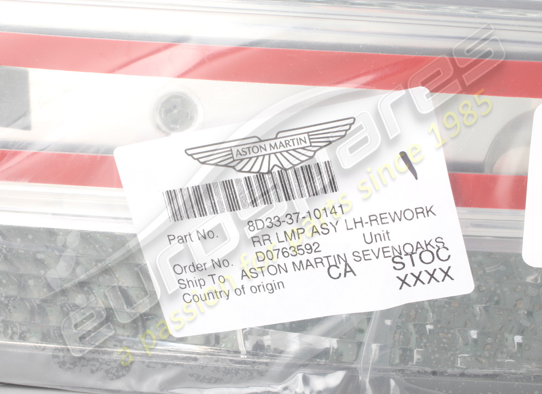 NEW ASTON MARTIN LEFT REAR LIGHT (LE MANS CLEAR). PART NUMBER 8D333710141 (6) new aston martin left rear light (le mans clear). part number 8d333710141 (6)