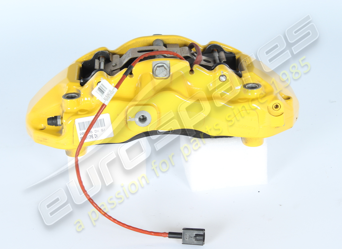 USED FERRARI FRONT RH CALIPER WITH PADS. PART NUMBER 297309 (3) used ferrari front rh caliper with pads. part number 297309 (3)