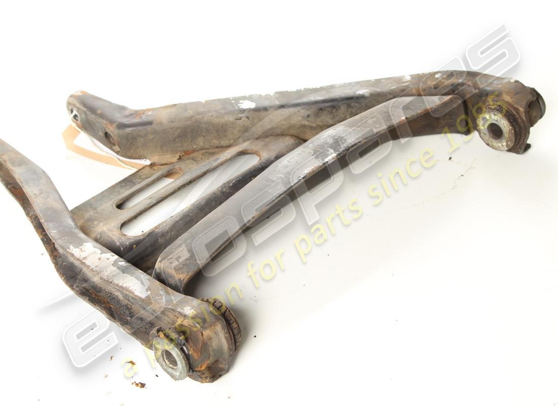 USED FERRARI LH FRONT LOWER SUSPENSION LEVER. PART NUMBER 104402 (3) used ferrari lh front lower suspension lever. part number 104402 (3)