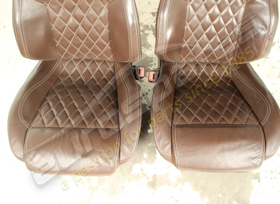 USED FERRARI COMPLETE SEAT SET WITH REAR SCREENS. PART NUMBER EAP1564144 (2) used ferrari complete seat set with rear screens. part number eap1564144 (2)