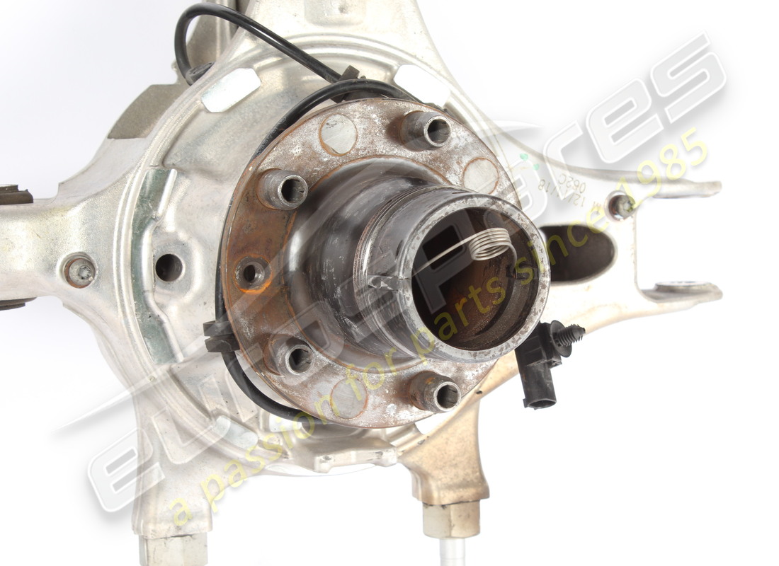 USED FERRARI COMPLETE RH REAR HUB CARRIER. PART NUMBER 335320 (2) used ferrari complete rh rear hub carrier. part number 335320 (2)