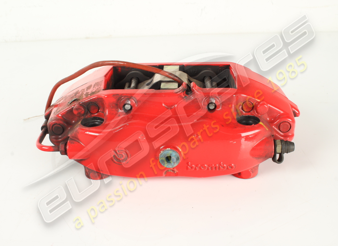 USED FERRARI RH REAR CALIPER UNIT WITH PADS. PART NUMBER 228020 (2) used ferrari rh rear caliper unit with pads. part number 228020 (2)