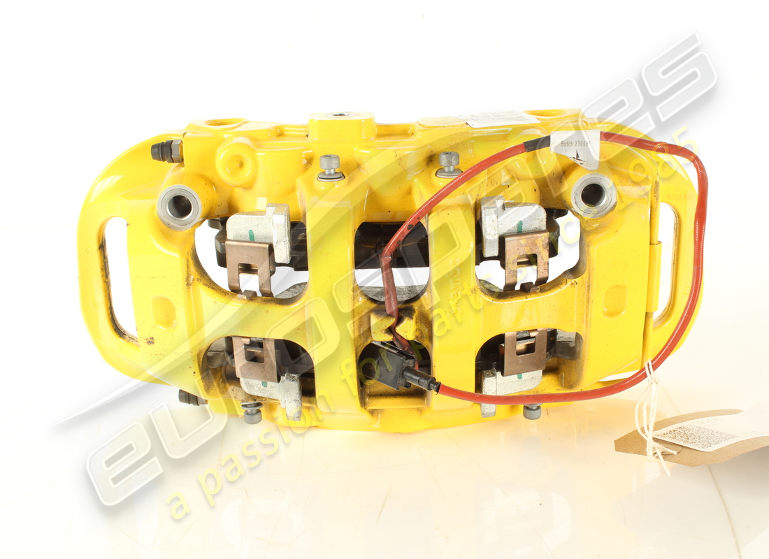 USED FERRARI FRONT LH CALIPER WITH PADS. PART NUMBER 322140 (2) used ferrari front lh caliper with pads. part number 322140 (2)