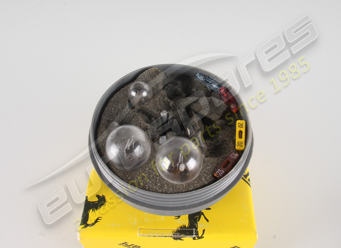 NEW FERRARI BOX WITH SPARE BULBS. PART NUMBER 138672 (2) new ferrari box with spare bulbs. part number 138672 (2)
