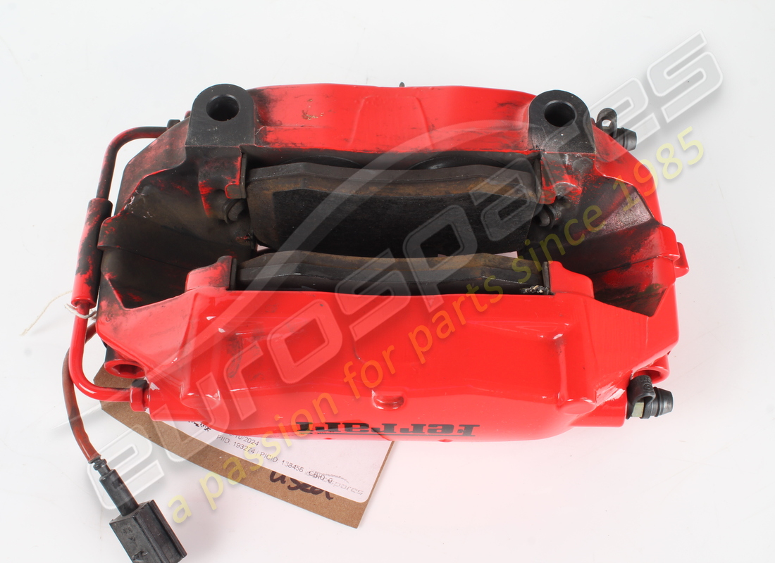 USED FERRARI RH REAR CALIPER UNIT WITH PADS. PART NUMBER 228020 (3) used ferrari rh rear caliper unit with pads. part number 228020 (3)