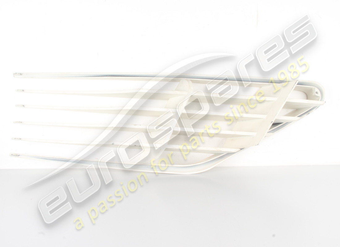 NEW FERRARI RH SIDE INTAKE GRILLE (PLASTIC). PART NUMBER 60671200 (5) new ferrari rh side intake grille (plastic). part number 60671200 (5)