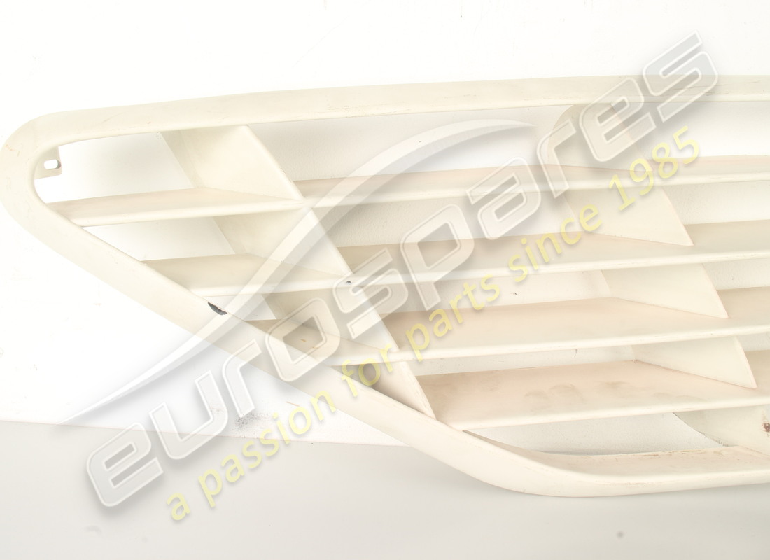 NEW FERRARI RH SIDE INTAKE GRILLE (PLASTIC). PART NUMBER 60671200 (3) new ferrari rh side intake grille (plastic). part number 60671200 (3)