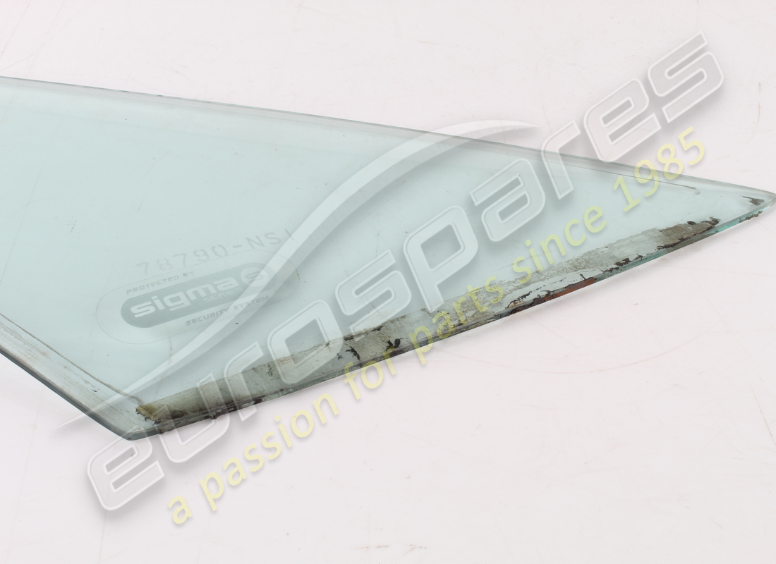 USED FERRARI RH QUARTER GLASS GTS. PART NUMBER 62344400 (3) used ferrari rh quarter glass gts. part number 62344400 (3)