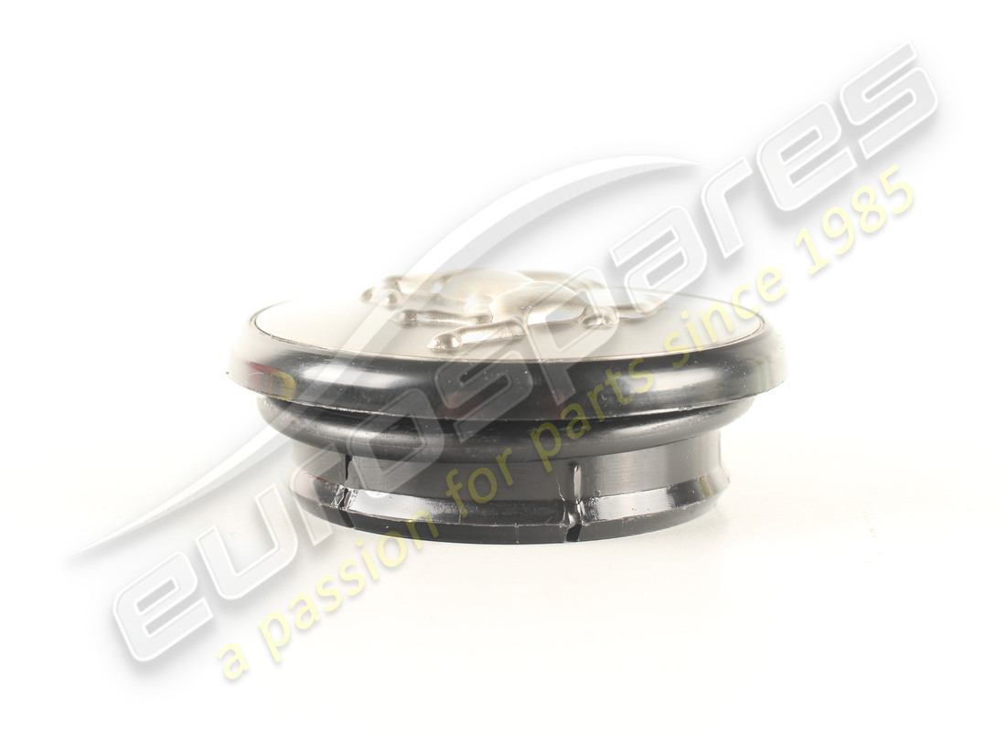 NEW FERRARI SET 4 TITANIUM PUSH IN HUB CAPS. PART NUMBER 70001285 (3) new ferrari set 4 titanium push in hub caps. part number 70001285 (3)