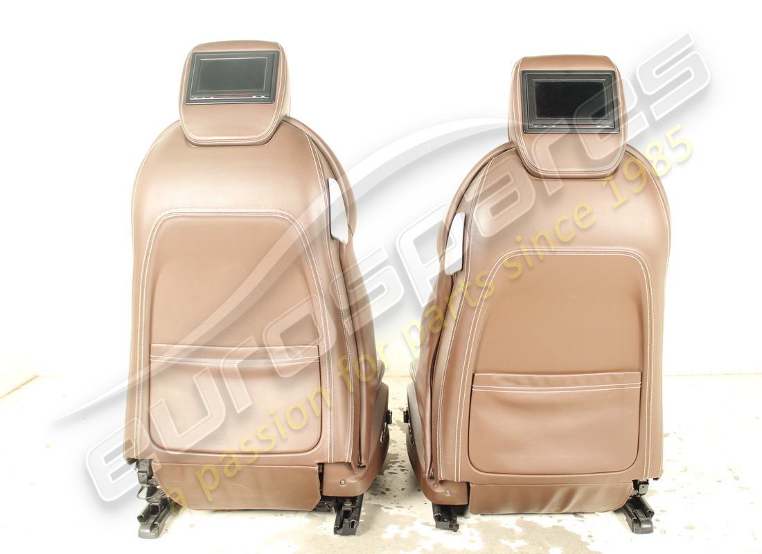 USED FERRARI COMPLETE SEAT SET WITH REAR SCREENS. PART NUMBER EAP1564144 (12) used ferrari complete seat set with rear screens. part number eap1564144 (12)