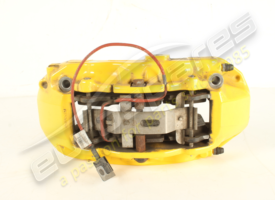 USED FERRARI FRONT RH CALIPER WITH PADS. PART NUMBER 297309 (2) used ferrari front rh caliper with pads. part number 297309 (2)