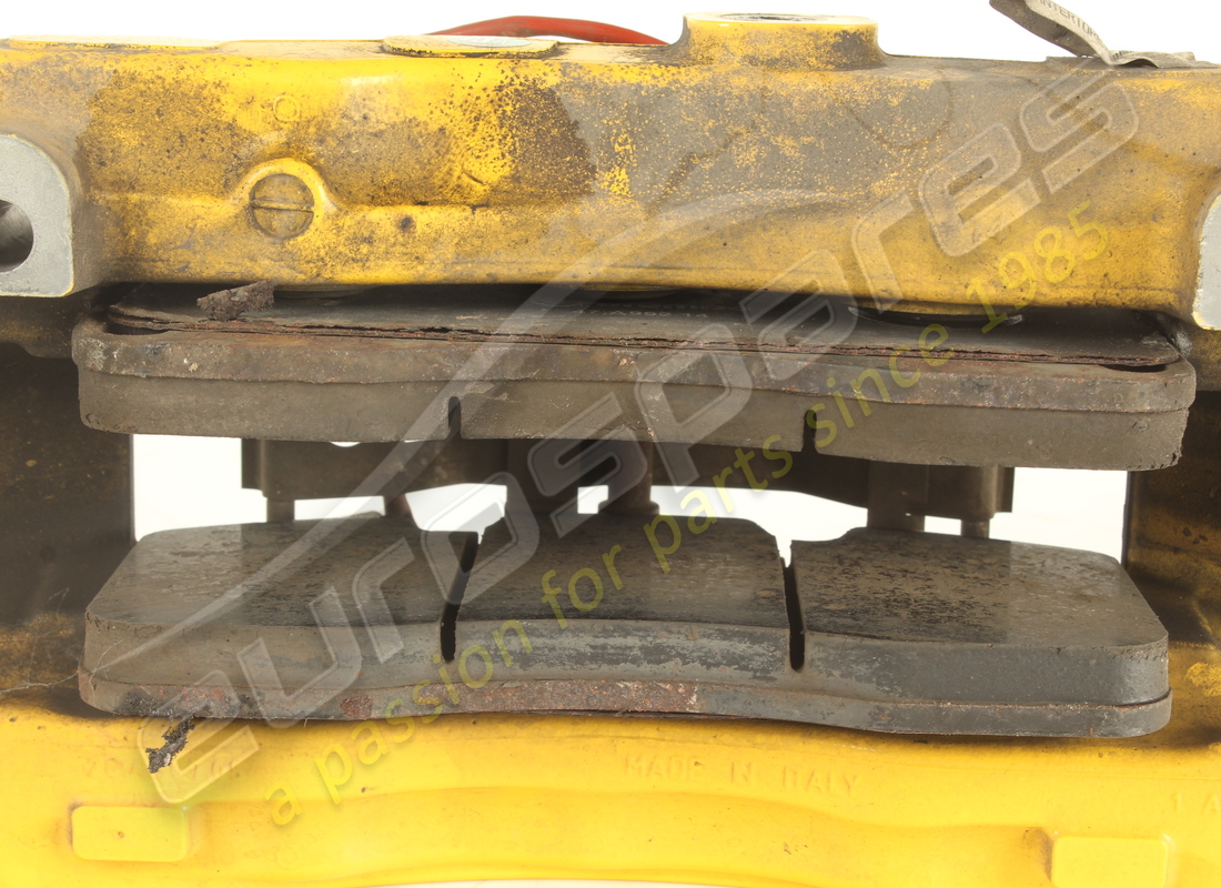 used ferrari front lh caliper with pads. part number 297308 (3)