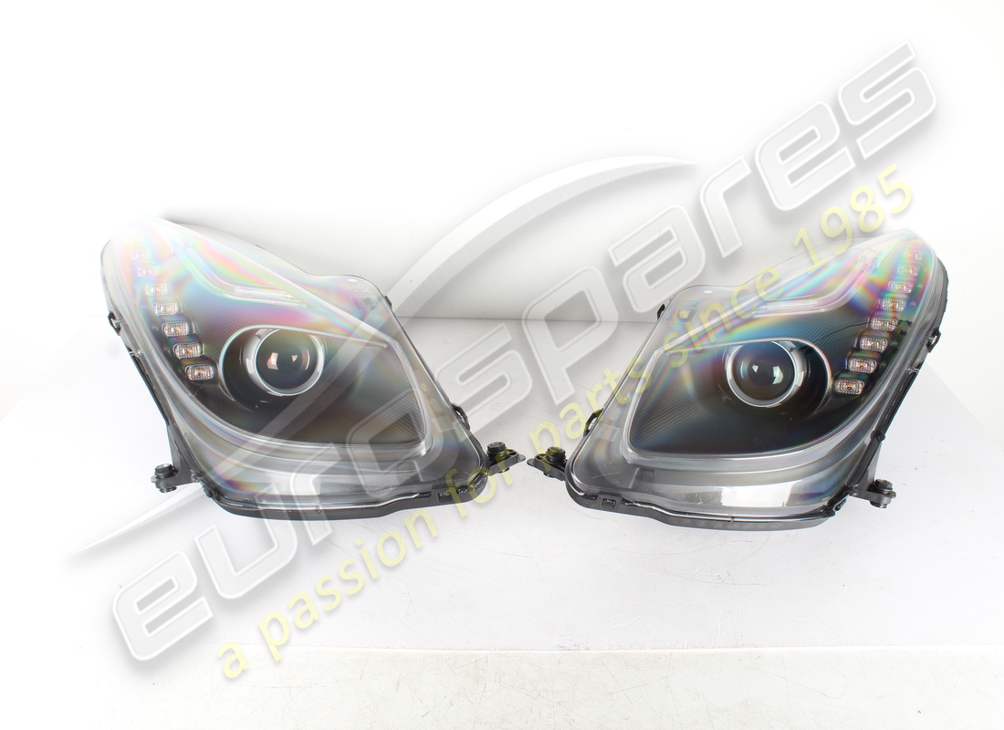 NEW FERRARI CARBON HEADLAMP KIT. PART NUMBER 70003399 (1) new ferrari carbon headlamp kit. part number 70003399 (1)