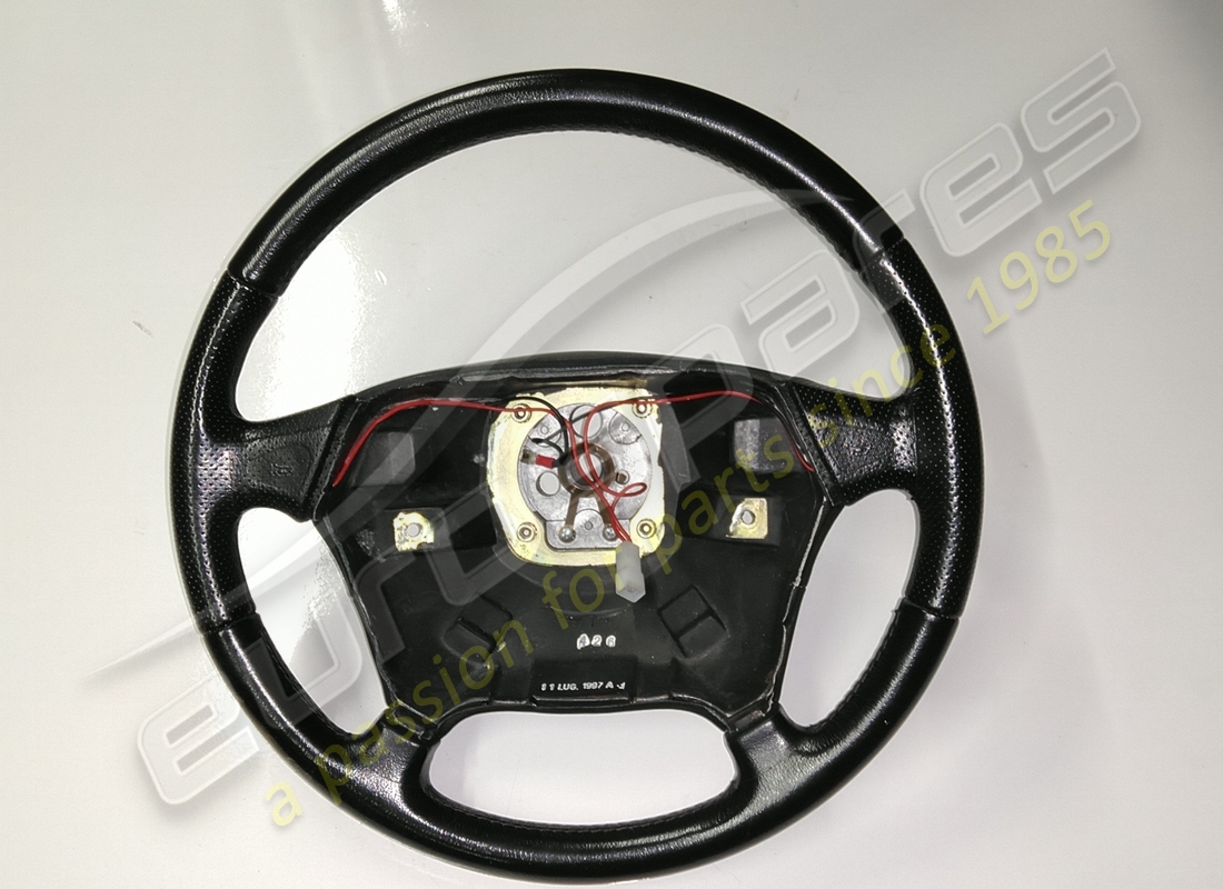 USED FERRARI STEERING WHEEL IN BLACK (CAN USE 164249). PART NUMBER 65846500 (1) used ferrari steering wheel in black (can use 164249). part number 65846500 (1)
