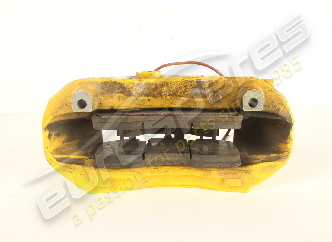 USED FERRARI FRONT RH CALIPER WITH PADS. PART NUMBER 297309 (3) used ferrari front rh caliper with pads. part number 297309 (3)