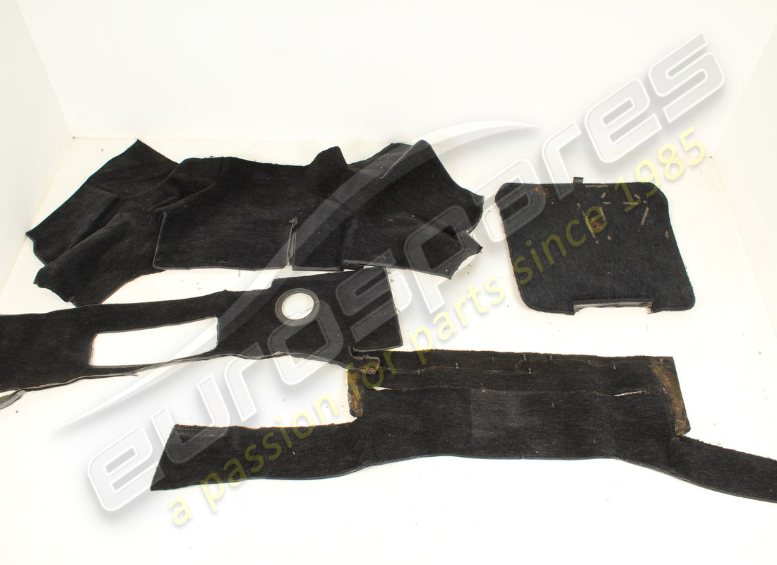 USED FERRARI LUGGAGE COMPARTMENT CARPET SET RHD BLACK. PART NUMBER 61571000 (3) used ferrari luggage compartment carpet set rhd black. part number 61571000 (3)