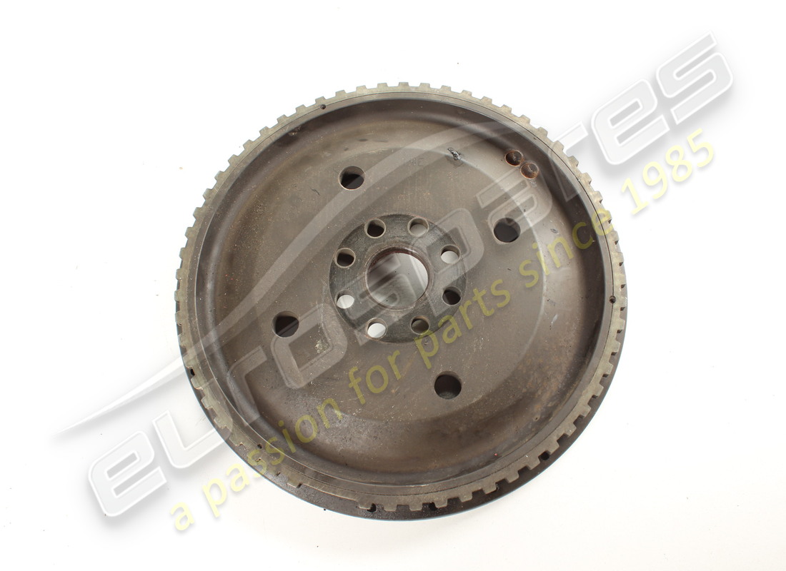USED FERRARI ENGINE FLYWHEEL COMPLETE. PART NUMBER 181596 (2) used ferrari engine flywheel complete. part number 181596 (2)