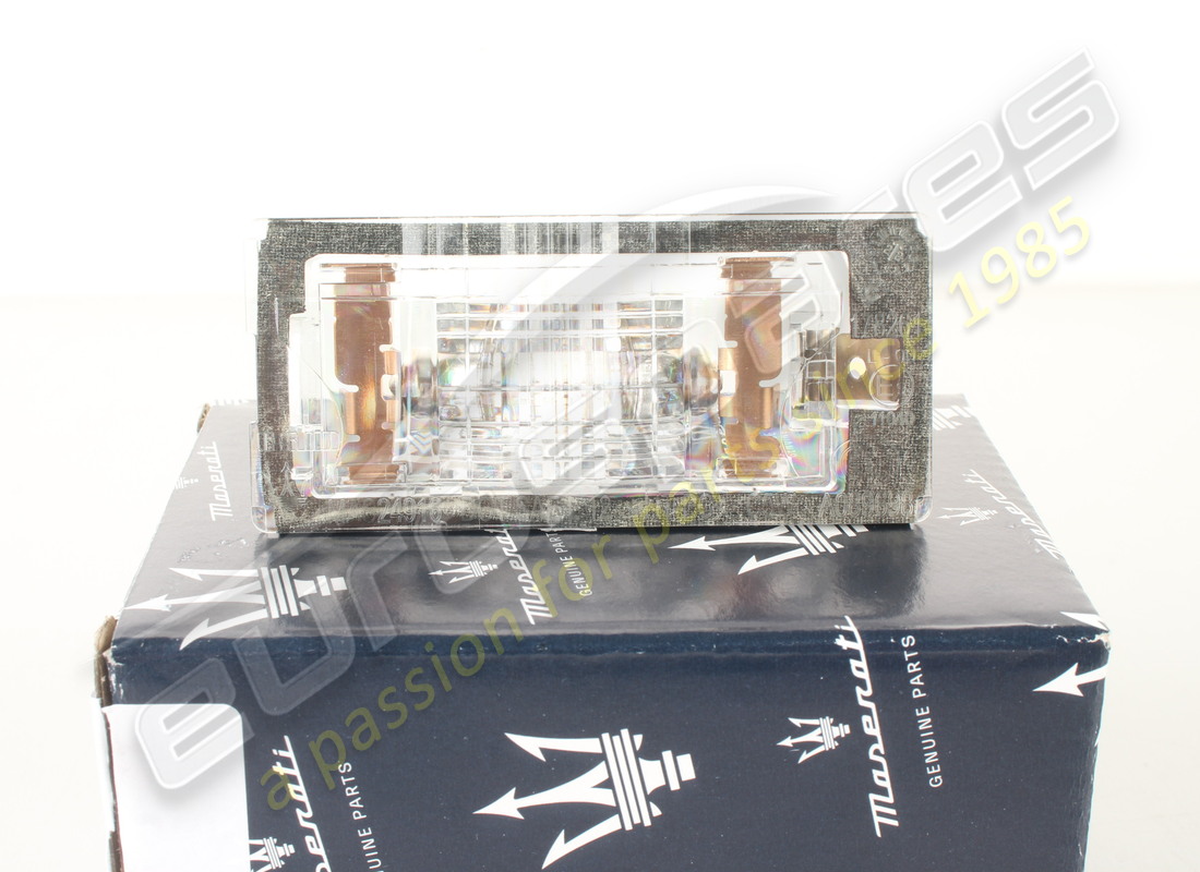 NEW MASERATI LIGHT PLATE. PART NUMBER 673000064 (4) new maserati light plate. part number 673000064 (4)