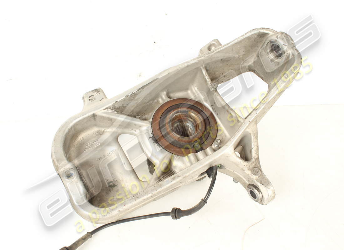 USED FERRARI COMPLETE LH FRONT HUB CARRIER. PART NUMBER 268377 (3) used ferrari complete lh front hub carrier. part number 268377 (3)