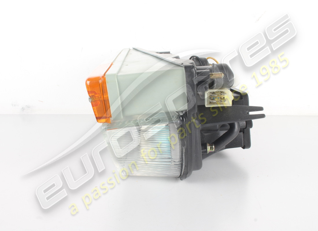 NEW FERRARI LH FRONT LIGHT RHD PART NUMBER 61880000 (3) new ferrari lh front light rhd part number 61880000 (3)