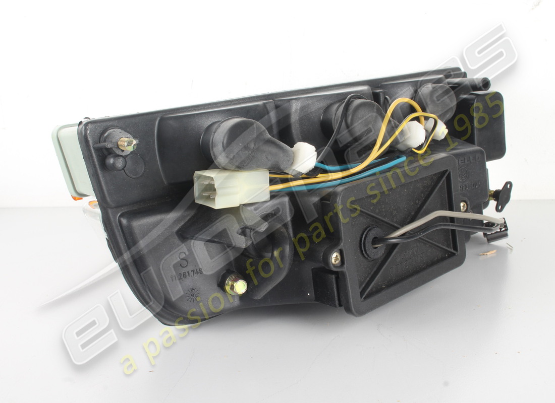 NEW FERRARI LH FRONT LIGHT RHD PART NUMBER 61880000 (4) new ferrari lh front light rhd part number 61880000 (4)