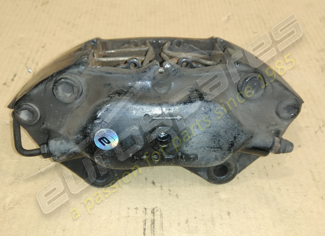 USED FERRARI LH REAR BRAKE CALIPER. PART NUMBER 178907 (2) used ferrari lh rear brake caliper. part number 178907 (2)