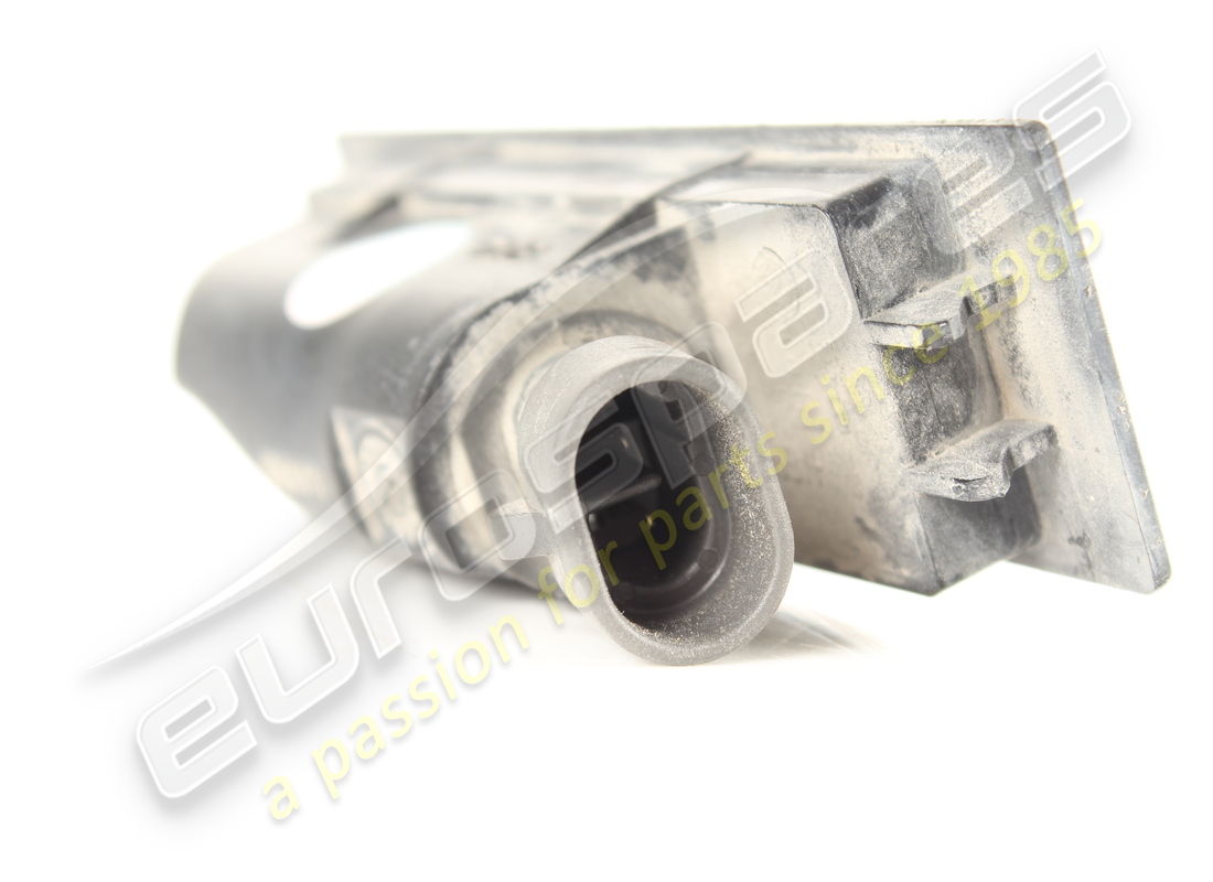 USED FERRARI REAR LICENSE PLATE LIGHT. PART NUMBER 264480 (3) used ferrari rear license plate light. part number 264480 (3)