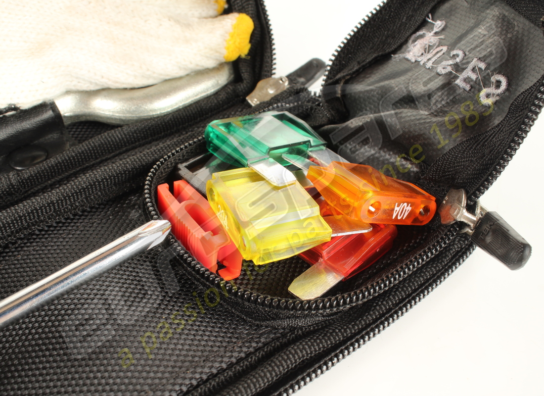 USED FERRARI TOOL KIT. PART NUMBER 268083 (3) used ferrari tool kit. part number 268083 (3)