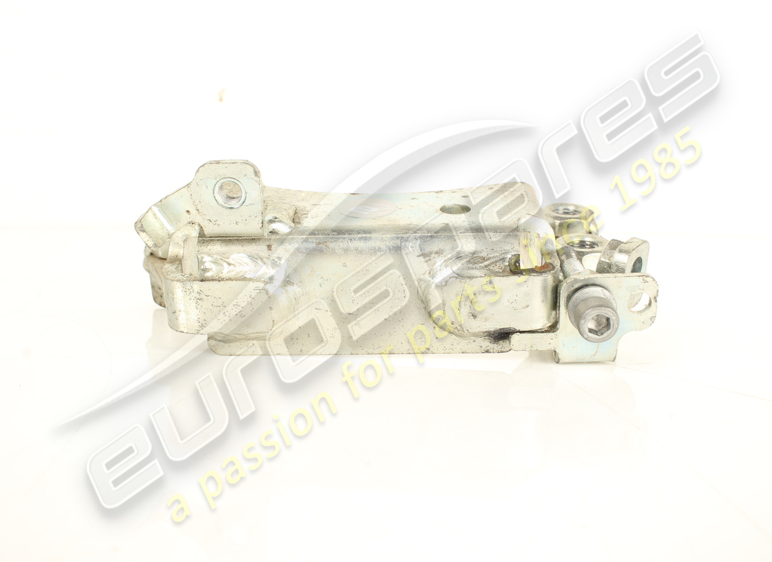 USED FERRARI LH BUSH TRAVEL LIMITER BRACKET. PART NUMBER 949996 (4) used ferrari lh bush travel limiter bracket. part number 949996 (4)