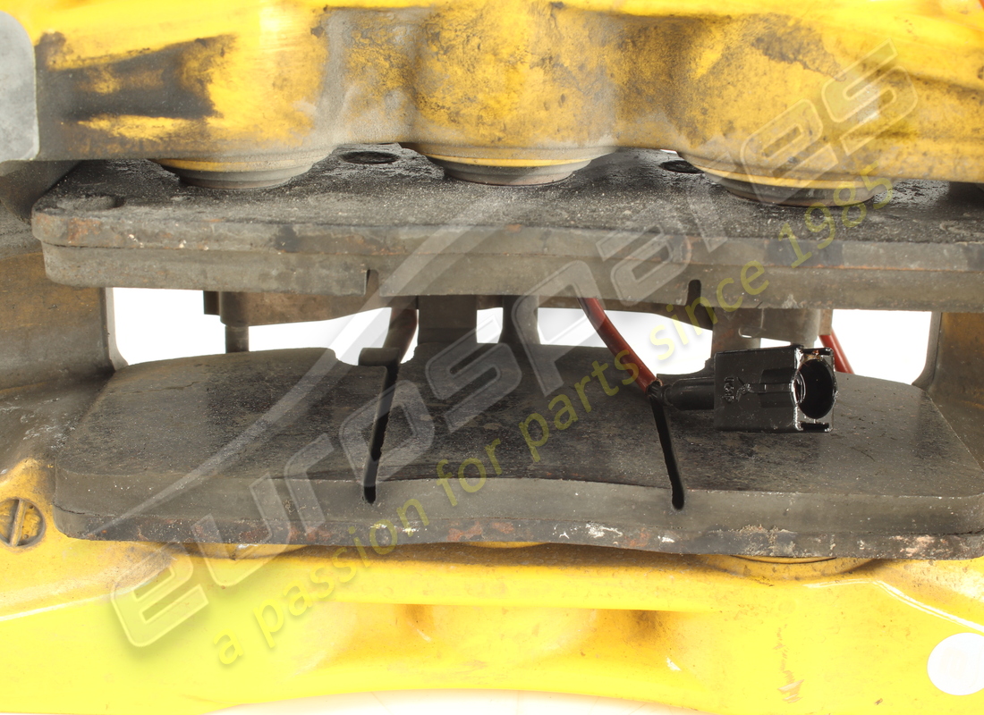 USED FERRARI FRONT LH CALIPER WITH PADS -. PART NUMBER 267314 (6) used ferrari front lh caliper with pads -. part number 267314 (6)